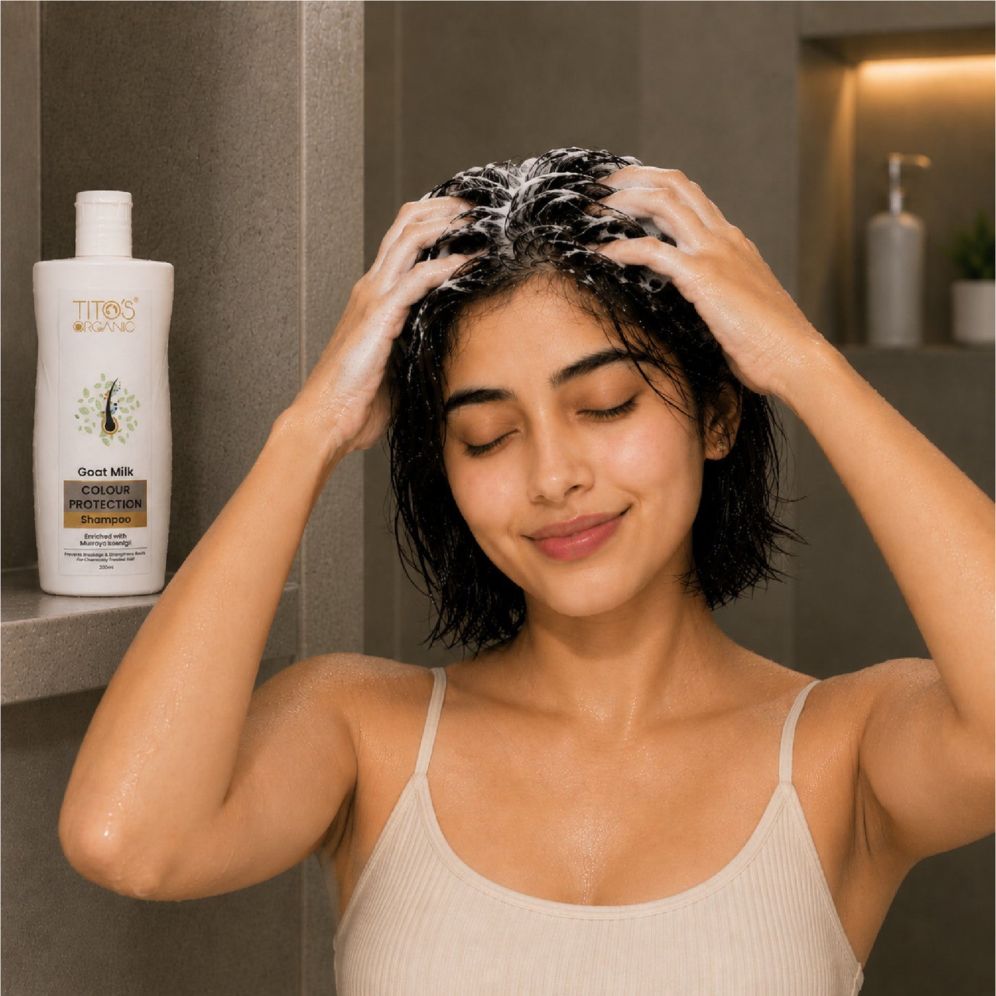 Woman washing hair with Tito’s Organic Goat Milk Colour Protection Shampoo in shower