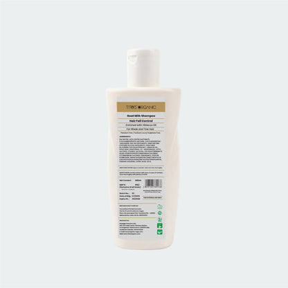 Bottle of shampoo with label on a white background