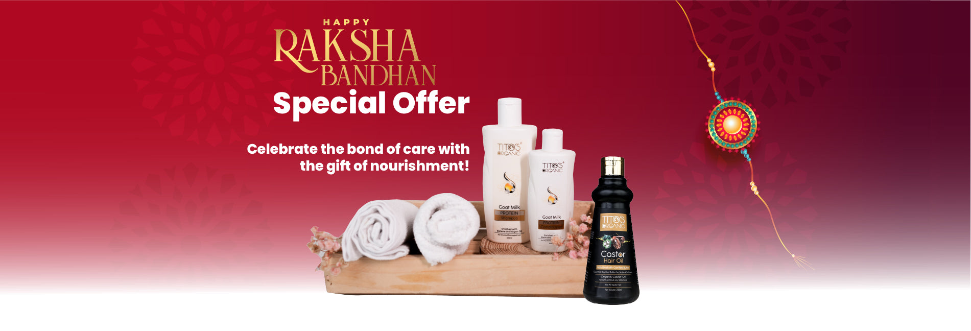 Promotional banner for Raksha Bandhan featuring a special offer with several personal care products arranged on a wooden tray with rolled towels. The products include white bottles and a black bottle, set against a red and pink gradient background with festive text and a decorative thread ornament.